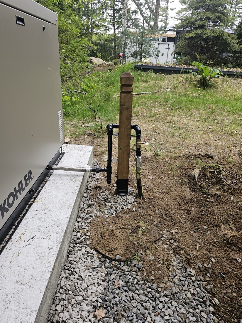 Standby generator installed on a gravel pad
