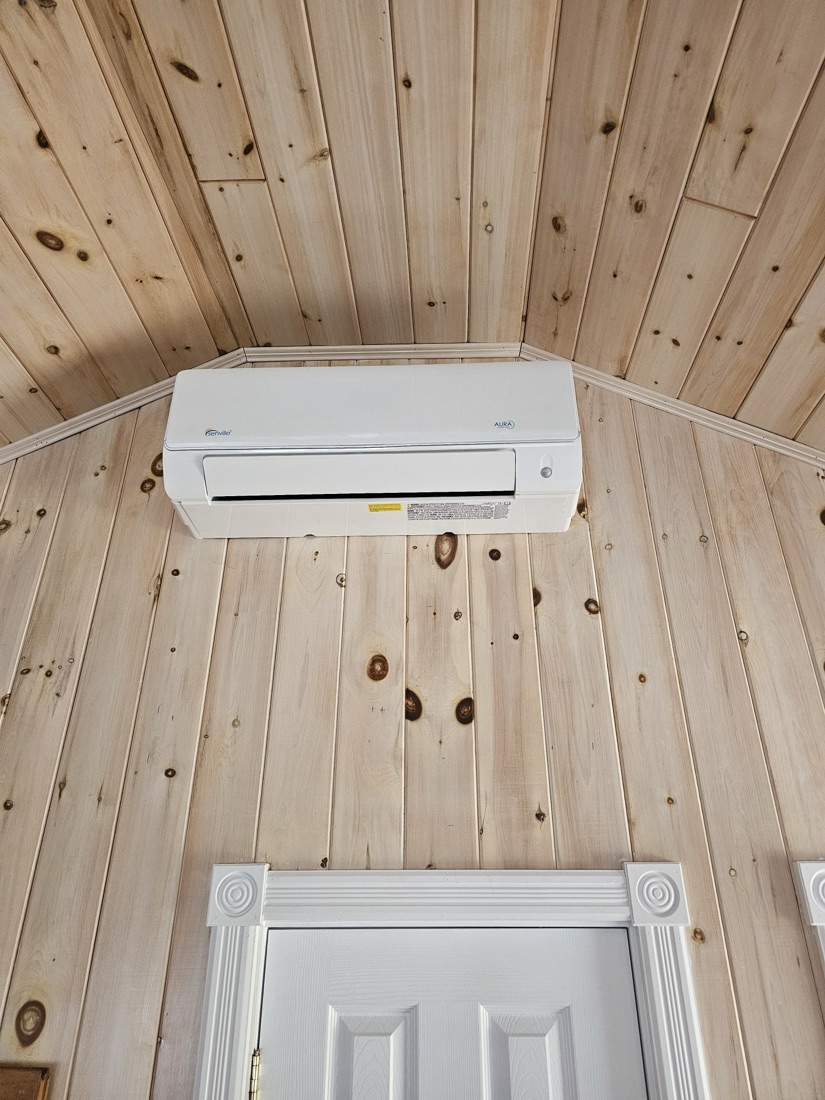 Ductless mini-split installed in a cedar sauna room
